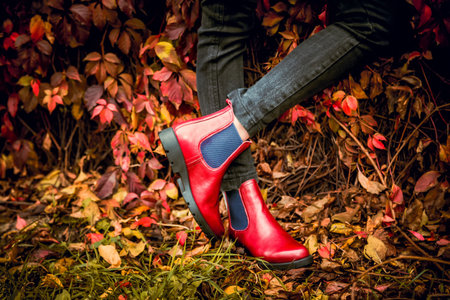 red leather boots, female autumn lookの写真素材