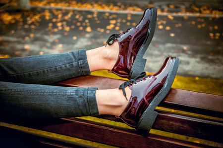 red patent shoes, female autumn lookの写真素材