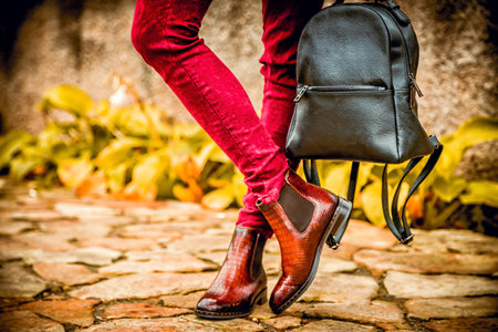 women's autumn look, brown crocodile leather boots women's shoesの写真素材