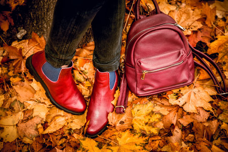 red leather boots, female autumn lookの写真素材