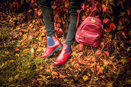 red leather boots, female autumn lookの写真素材