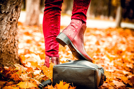 leather shoes red pants black backpack autumn female bowの写真素材