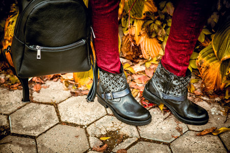 leather women's boots with stars, autumn lookの写真素材