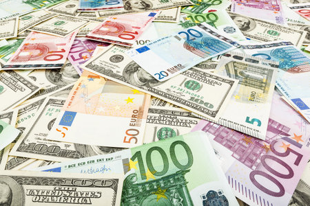 Paper money euro and dolar. background of banknotes for the screen saver on the monitor.の写真素材