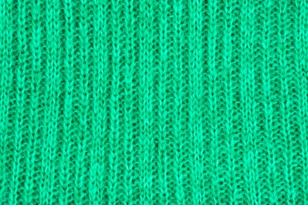 Knitted fabric textured background. Screen saver on your desktop or laptopの写真素材