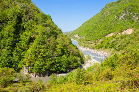 River in mountains against blue sky. Georgia. Mountain landscape.