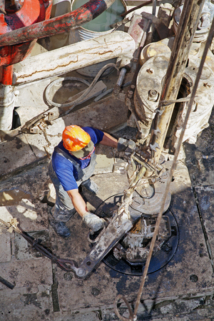 Oil industry. Working on the oil rigs. Drilling rig workersの写真素材