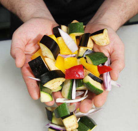 ut vegetables in her handsの写真素材