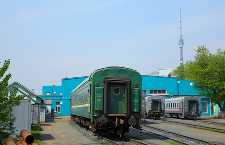 MOSCOW, RUSSIA - may 13, 2013. Moscow railway depot. Place of stand, repair and equipment of trains. Ostankino TV tower in the backgroundのeditorial素材