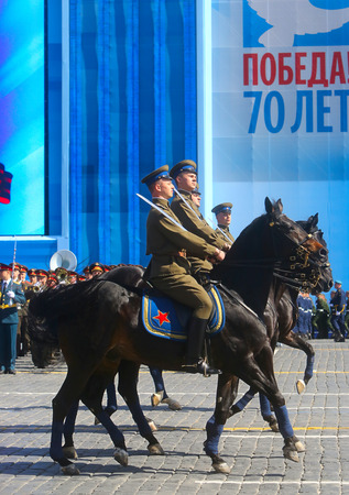MOSCOW, 07 MAY, 2015: Russian soldiers on horseback in uniform of World War II march through Red Square during the final rehearsal of the Victory Day military parade on Red square in Moscow, Russiaのeditorial素材