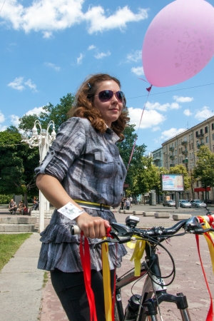 KHARKIV, UKRAINE - JUNE 08: Bicycle Action Girls in plaid in Kharkiv, Ukraine on June 08, 2013のeditorial素材