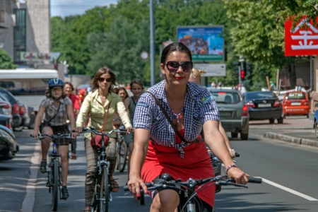 KHARKIV, UKRAINE - JUNE 08: Bicycle Action Girls in plaid in Kharkiv, Ukraine on June 08, 2013のeditorial素材
