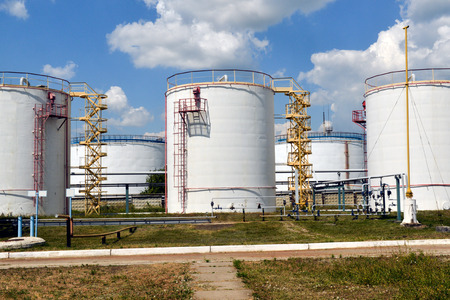 White Oil Tanks in Petrochemical Refinery Plantの写真素材