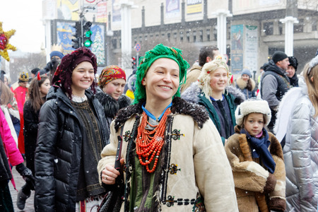 Kharkiv, Ukraine - January 13, 2018 - Participants traditional Christmas of Verteps Parade (nativity Scene), Christmas stars, carols singing. People wearing carnival clothes posing and smiling. Winter outdoor image.のeditorial素材