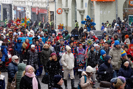 Kharkiv, Ukraine - January 13, 2018 - Participants traditional Christmas of Verteps Parade (nativity Scene), Christmas stars, carols singing. People wearing carnival clothes posing and smiling. Winter outdoor image.のeditorial素材