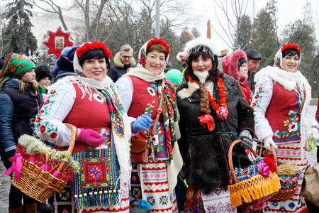 Kharkiv, Ukraine - January 13, 2018 - Participants traditional Christmas of Verteps Parade (nativity Scene), Christmas stars, carols singing. People wearing carnival clothes posing and smiling. Winter outdoor image.のeditorial素材