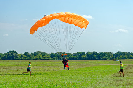 Kharkiv, Ukraine - August 20, 2016: Skydiver landed after the jump at the airfield Korotych, Kharkov...