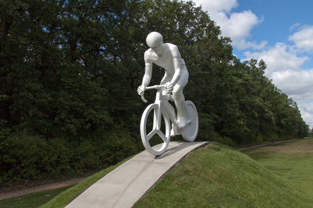 Kharkiv, Ukraine - August 21, 2012: Monument to a "white bicyclist" by Alexander Ridnyi, installed in 2012 near the Belgorod highway, where many bike rider were died in a fatal road accidents.のeditorial素材