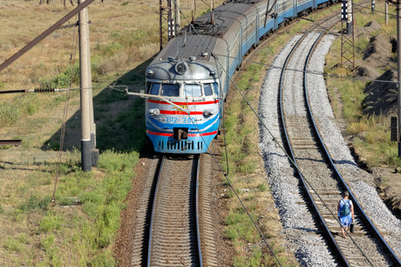 Kharkiv, Ukraine - August 23, 2018: Suburban train arrives at station Osnova in Kharkiv on a sunny summer dayのeditorial素材