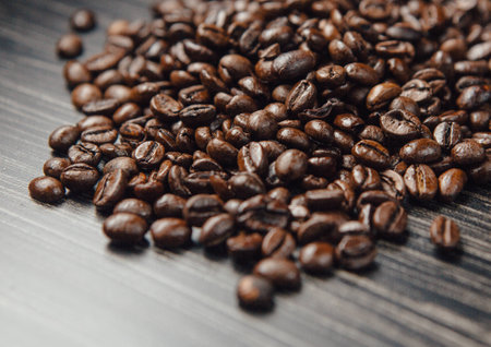 Close-up image of coffee beans on dark backgroundの写真素材