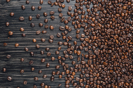 Close-up image of coffee beans on dark backgroundの写真素材