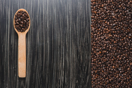 Copy space image of coffee Beans in wooden spoonの写真素材