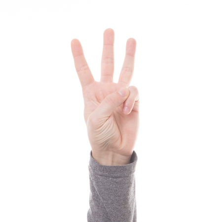 Hand count sign three finger isolated on white backgroundの写真素材