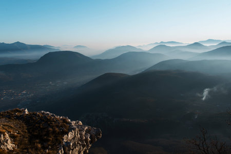 Great sunset on mountains with fog. Beautiful backgroundの写真素材