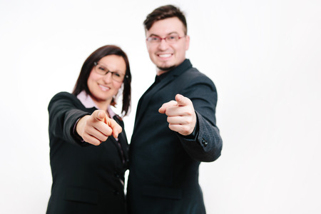 Couple of cute business partners on white backgroundの写真素材