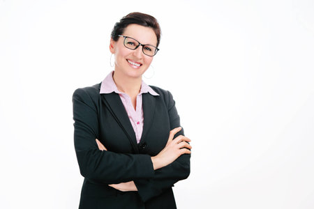 Cute business lady in black jacket on white backgroundの写真素材