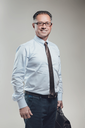 Attractive business man portrait in white shirtの写真素材