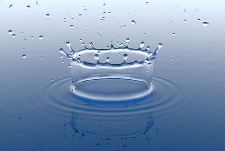 Water splash and drops with ripples, close-up view.の写真素材
