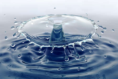 Water splash and drops with ripples, close-up view.の写真素材