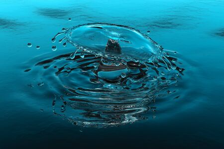 Water splash and drops with ripples, close-up view.の写真素材