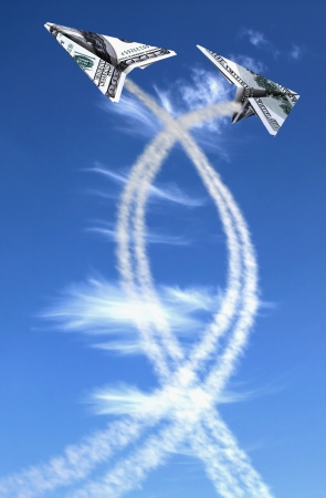 Two hundred dollars planes on cloudy sky and trace .の写真素材