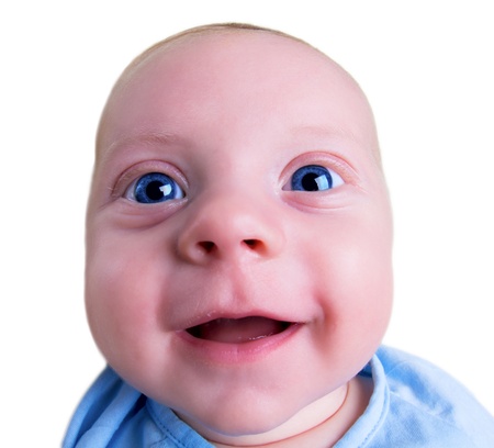 Portrait of cheerful 2-month old baby boy.の写真素材
