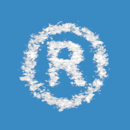 Registered trademark symbol, made of clouds on blue sky background.の写真素材