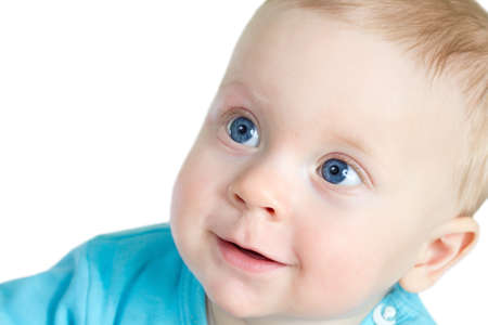 Portrait of 8-months old baby boy in blue t-shirt, on white background の写真素材