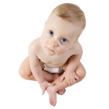 Nine month boy sitting, top view shot, on white background の写真素材