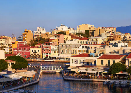 Agios Nikolaos embankment at evening in Crete, Greece.の写真素材