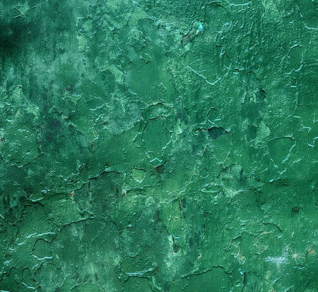Aged metal  surface covered with green peeling paintの写真素材