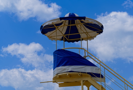 Life-guard tower against blue skyの写真素材