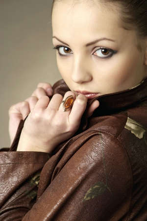 A young beautiful woman studio closeup portraitの写真素材