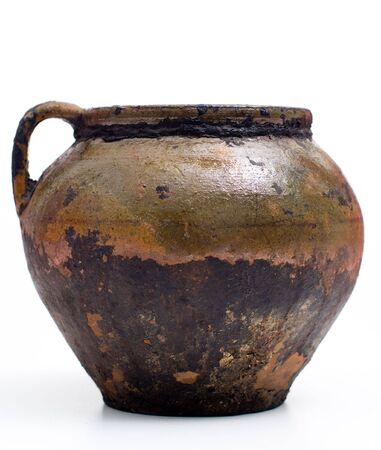 Ancient ceramic pot at white backgroundの写真素材
