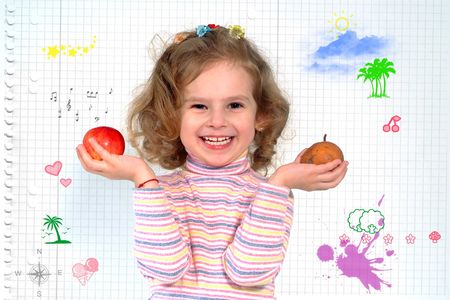 Playful little pretty schoolgirl holding apple and pearの写真素材