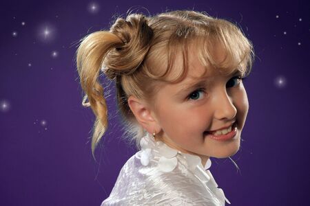 Closeup portrait of young smiling pretty girlの写真素材