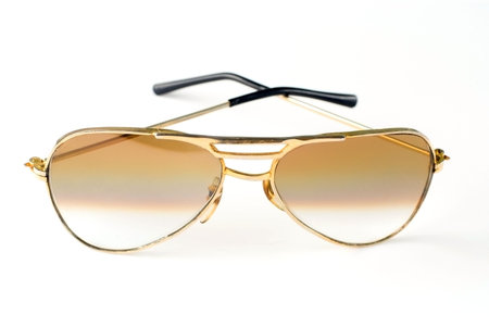 Elegant mens toned sunglasses at white background