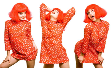 Baby doll redheaded screaming girl in little dressの写真素材