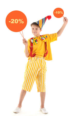 Emotional clown boy holding discounts signsの写真素材