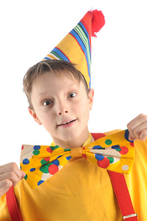 Brightly dressed emotional clown boy portraitの写真素材